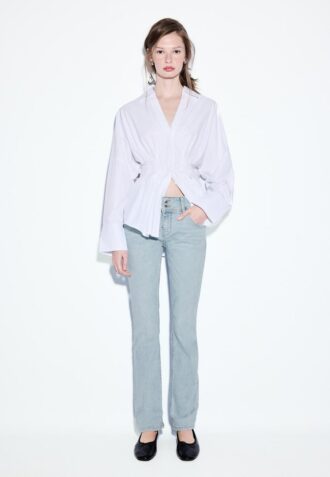 Blugi slim fit cu talie joasă