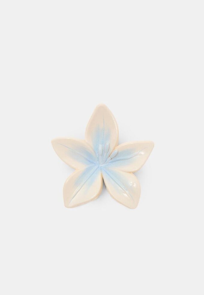 Clemă cu floare