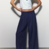 Pantaloni croiți cu croi larg și pense