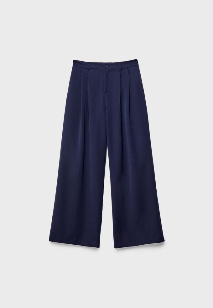 Pantaloni croiți cu croi larg și pense