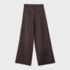 Pantaloni croiți cu croi larg și pense