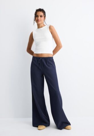 Pantaloni cu croi larg, cu efect de in
