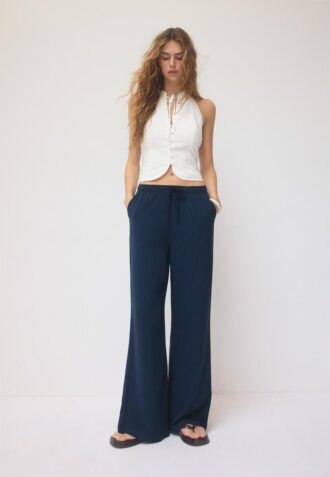 Pantaloni fluizi cu efect de in