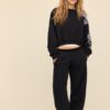 Pantaloni jogger din fleece cu spălare acidă și textură Soft-Touch Pantaloni jogger din fleece cu spălare acidă și textură Soft-Touch