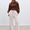 Pantaloni jogger Wide Leg, cu textură Soft-Touch la atingere și detaliu de cusătură în față Pantaloni jogger Wide Leg, cu textură Soft-Touch la atingere și detaliu de cusătură în față