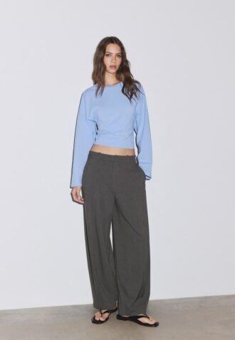 Pantaloni largi eleganți cu detalii la cusături