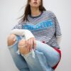 Tricou cu mâneci scurte și imprimeuri în dungi Tricou cu mâneci scurte și imprimeuri în dungi