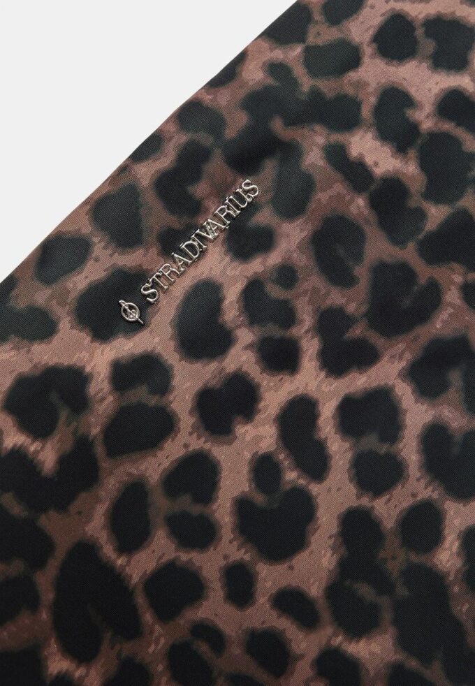 Trusă de toaletă cu imprimeu leopard și fermoar